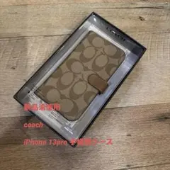 新品　COACH iPhone13 pro 手帳型カバー シグネチャー　コーチ
