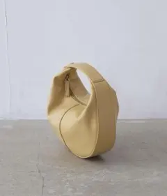 TOPKAPI EFOLE フェイクレザーラウンドミニバッグ イエロー