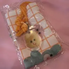 mojojojo アクリルチャーム付き巾着　パステル　オレンジ