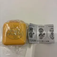 ①Polly Pocket ミニチュアチャーム　イエロー　ローリーポケット