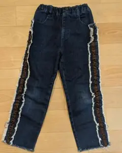 プティマイン　ダークブルーデニムパンツ サイドフリル付き　130cm