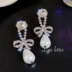 No.305A キラキラビジューパールリボンピアス 韓国 量産型 地雷 春夏