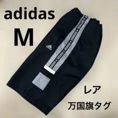アディダスadidasナイロンハーフパンツMブラック万国旗タグ - メルカリ
