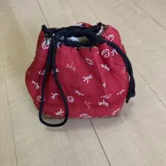 赤いトンボ柄の和装バッグ