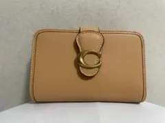 コーチ　レディース　折財布　アプリコット　小銭入れあり　新品　未使用