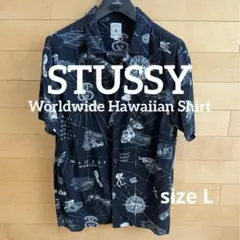 【日本製】STUSSY ワールドツアー アロハシャツ 総柄 レーヨン 黒Lサイズのサムネイル