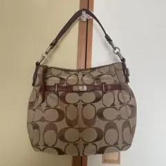coach コーチ　肩掛け　ショルダーバッグ　シグネチャー柄　総柄　ブラウン
