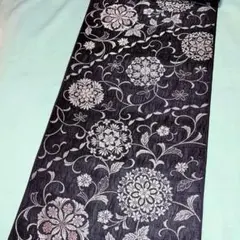 西陣織九寸帯未仕立品 （株）弥栄織物墨黒地華文更紗 正絹 新品 - メルカリ