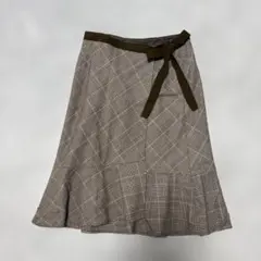 any sis キラキララメ入り　スカート　膝丈　ウエストリボン　裾フリル