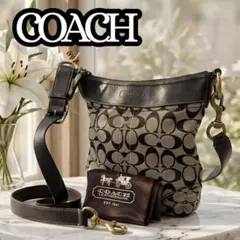 コーチ ショルダー　シグネチャー 肩掛け 定番サイズ ダッフル 黒　保存袋付きのサムネイル