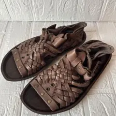 【punto pigro】編レザー　25㎝　フラットサンダル　ブラウンのサムネイル