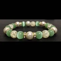 ４３８、エメラルドグリーンキャッツアイ×パール×イエロークラック水晶ブレスレット