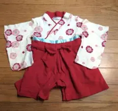赤と白の花柄袴風ベビー服