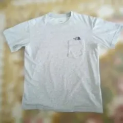 The North Face グレー ポケットTシャツ。メンズサイズМ。