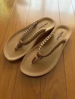 MINNETONKA ビーチサンダル 編み込みストラップ23.5cmのサムネイル
