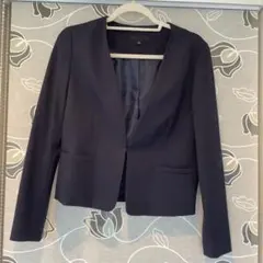 ネイビー ノーカラージャケット　ユニクロＬサイズ　ストレッチのサムネイル