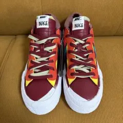 KAWS × sacai × Nike Blazer Low Team Red