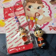 ペコちゃんこけしストラップ、おめでとうマスコット、ノートなど3点