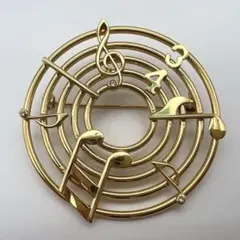 音楽モチーフの金色ブローチ