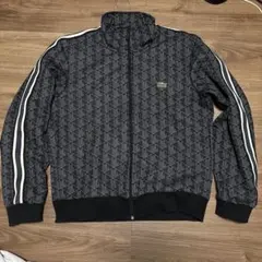 LACOSTE 幾何学模様トラックジャケット　us M LACOSTE トラックジャケット 幾何学模様 ブラック - メルカリ