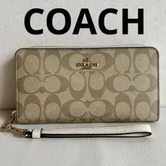 【未使用保管品】【コーチ】シグネチャー ラウンドファスナー 長財布 ストラップ付