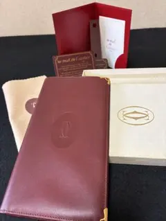 Cartier 長財布 マストライン ボルドー 箱付き 未使用 - メルカリ