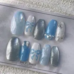 NO.67水色のぷっくりリボンとマグネットネイル