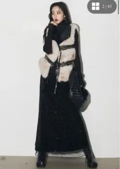 Andrea＆co. フェイクファーライダースベスト＋スパンコールスカート