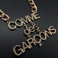 COMME des GARÇONS ネックレスレッドトップのみ - メルカリ