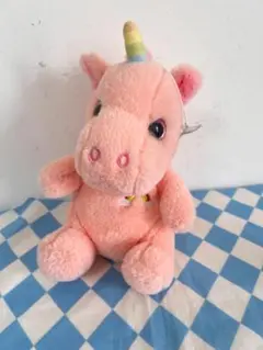 ピンクのユニコーンぬいぐるみ