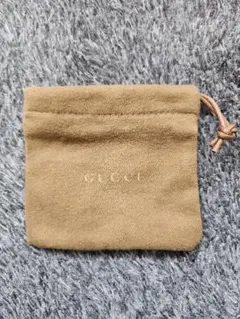 Gucci グッチ ベージュ 巾着袋　縦9.5cm×横10cm　しっかりめの生地のサムネイル