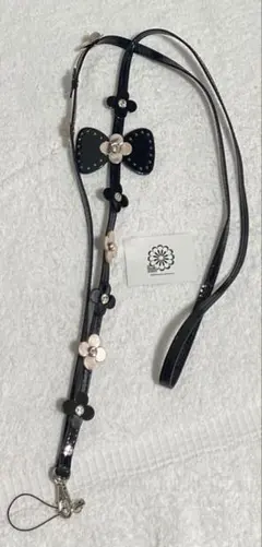 【新品・未使用】黒いリボンとお花のスマホストラップショルダー♡ 期間限定SALE