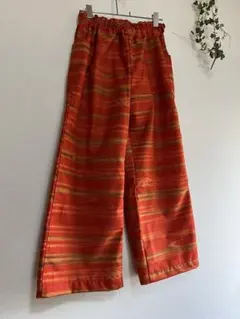 オリーブグリーンとオレンジストライプのワイドパンツ