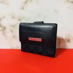 0020 GUCCI シマ ブラック 折り財布