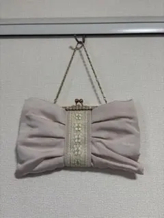 リボンデザインのパーティーバッグ　薄いピンク