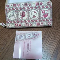 【たんぽぽ】ハローキティ 吉祥宝づくし 浅草文庫 長財布 ハローキティ」花々から顔を覗かせるキティがキュート！ 50周年記念の