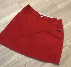 赤いAラインスカート NBロゴ付き