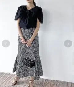 リボン付き黒半袖トップスのサムネイル