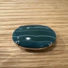 青緑色の楕円形帯留め