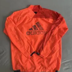 adidas ピステ・ウィンドブレーカー オレンジ