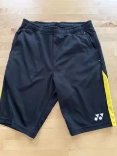 【未使用品】YONEX ハーフパンツ 黒/黄　メンズM