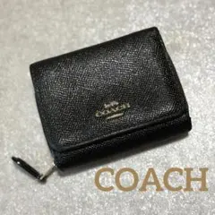 COACH コーチブラックレザー 二つ折り財布 エンボス加工 ブラック