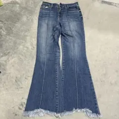 フリンジ裾ダークブルーフレアデニム