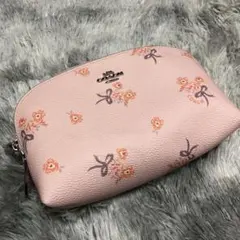 新品］COACH 蝶柄 レザーポーチ ！大幅値下げ中！ - メルカリ
