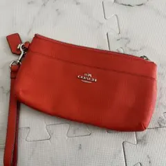 COACH オレンジ ポーチ 9923 - メルカリ