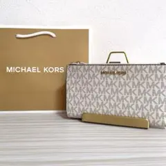 早い者勝ち！訳あり新品 MICHAEL KORS 長財布 シグネチャー
