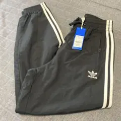 【新品】アディダス アディカラーウーブン ファイヤーバードトラックパンツ