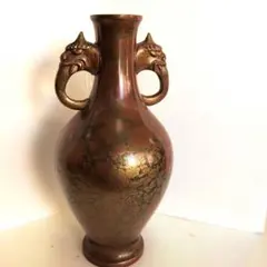 獅子彫刻の金属花瓶 - メルカリ