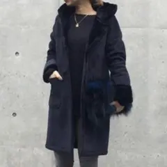 BY フェイクムートン フードロングコート