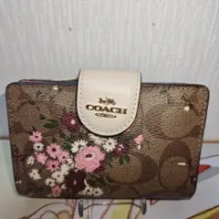 coach 花柄　二つ折り財布